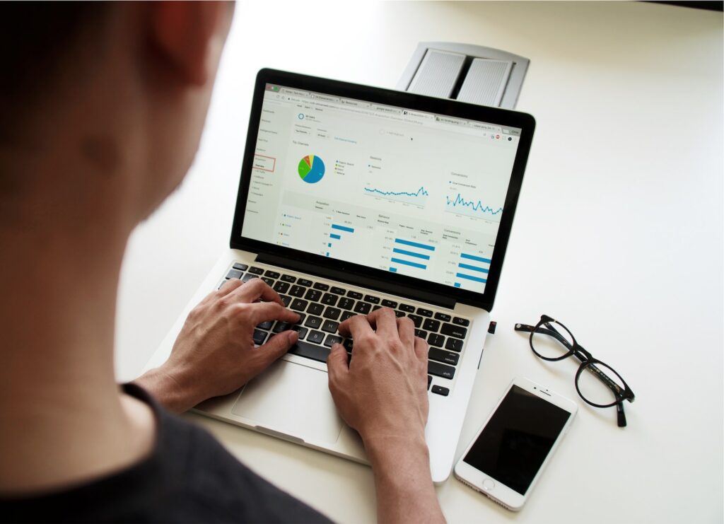 Man conducting market research using Google Analytics